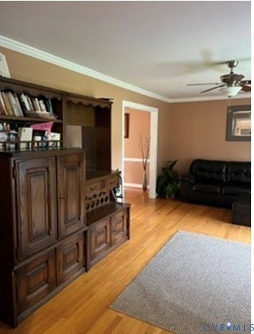 3732 Birdwood Road, Brookbury, Richmond, VA 23234 Hardwood flooring throughout featuring a ceiling fan, crown molding, and an arched entryway