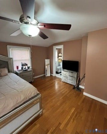 3732 Birdwood Road, Brookbury, Richmond, VA 23234 Hardwood flooring throughout featuring a ceiling fan with integrated lighting, a window with blinds, and a doorway leading to an adjoining space