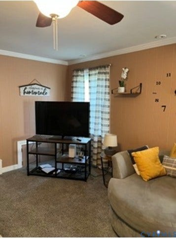 3732 Birdwood Road, Brookbury, Richmond, VA 23234 Room featuring a ceiling fan with light fixture, crown molding, and wall paneling