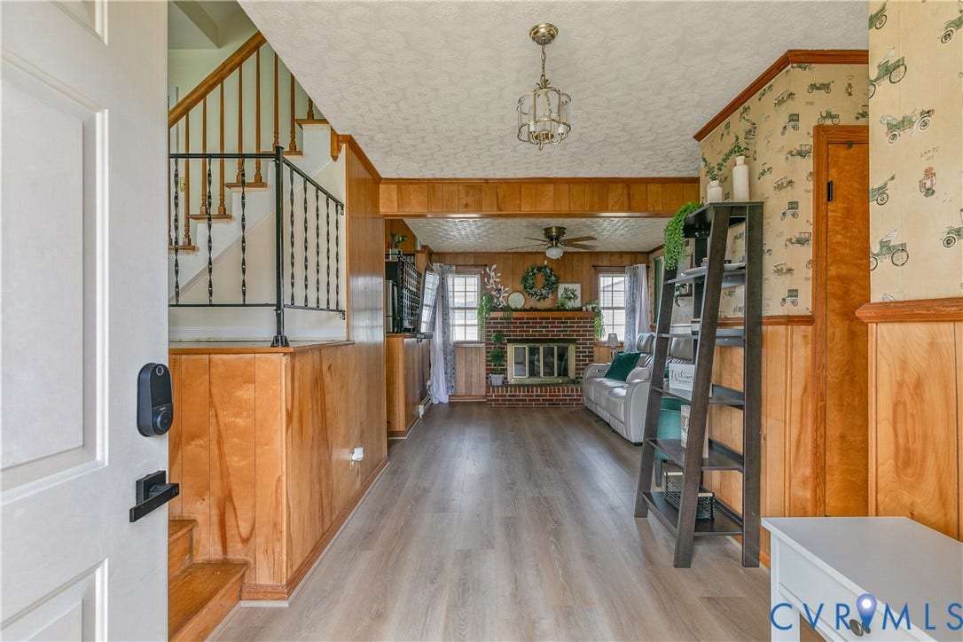 Open to family room with new LVT