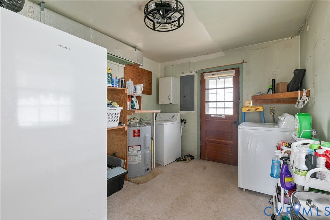 Utility room with laundry and rear access