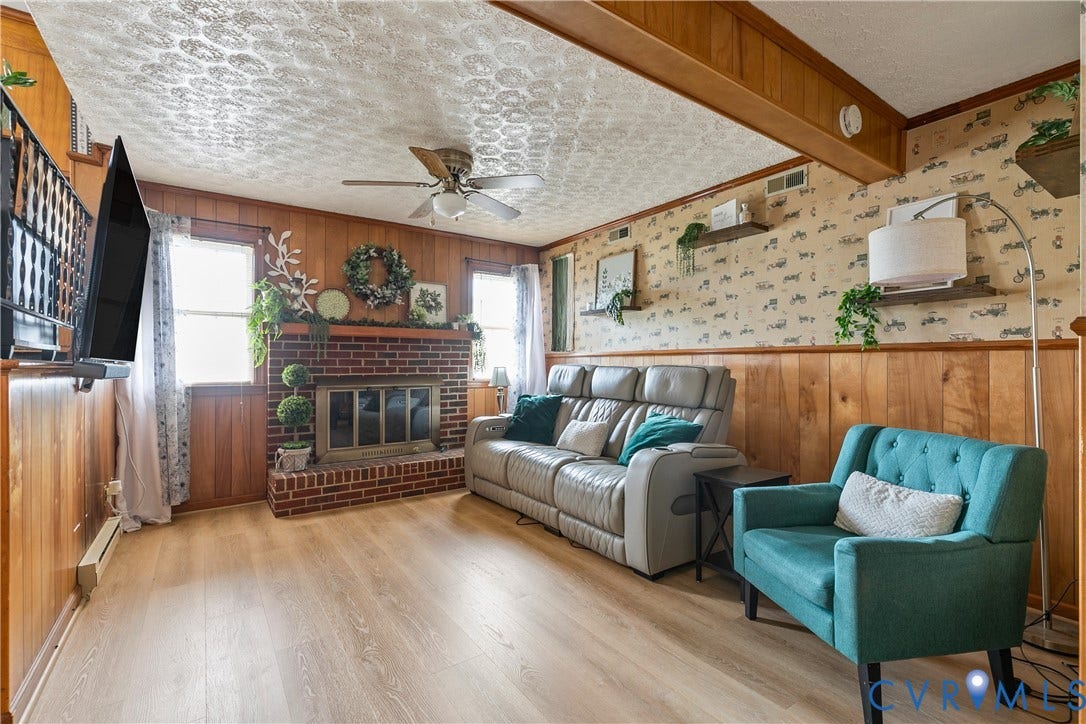 Family room with brick fireplace