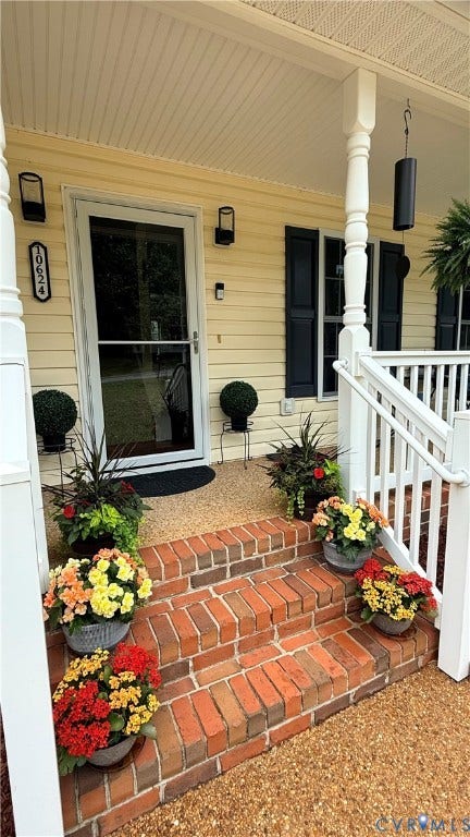 10624 Hamlin Drive, Hamlin Estates, Chester, VA 23831 Inviting front porch featuring a brick staircase, white railing, and exterior lighting