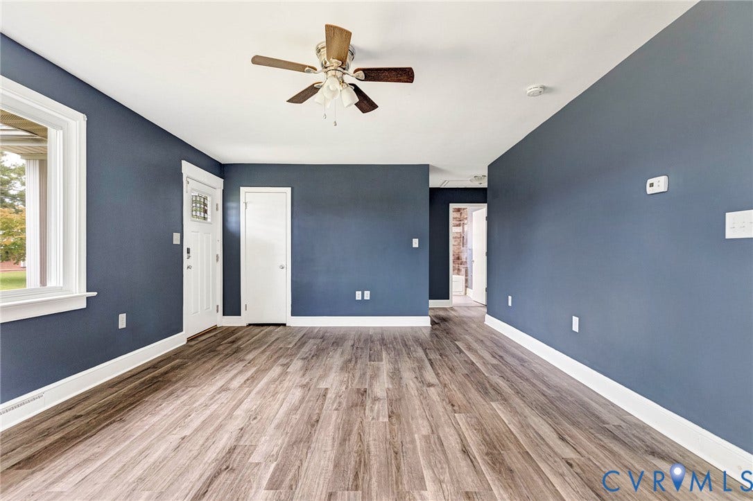 507 Walnut Avenue, Walnut Court, Colonial Heights, VA 23834 Wood-finish flooring, white trim, ceiling fan, and painted walls