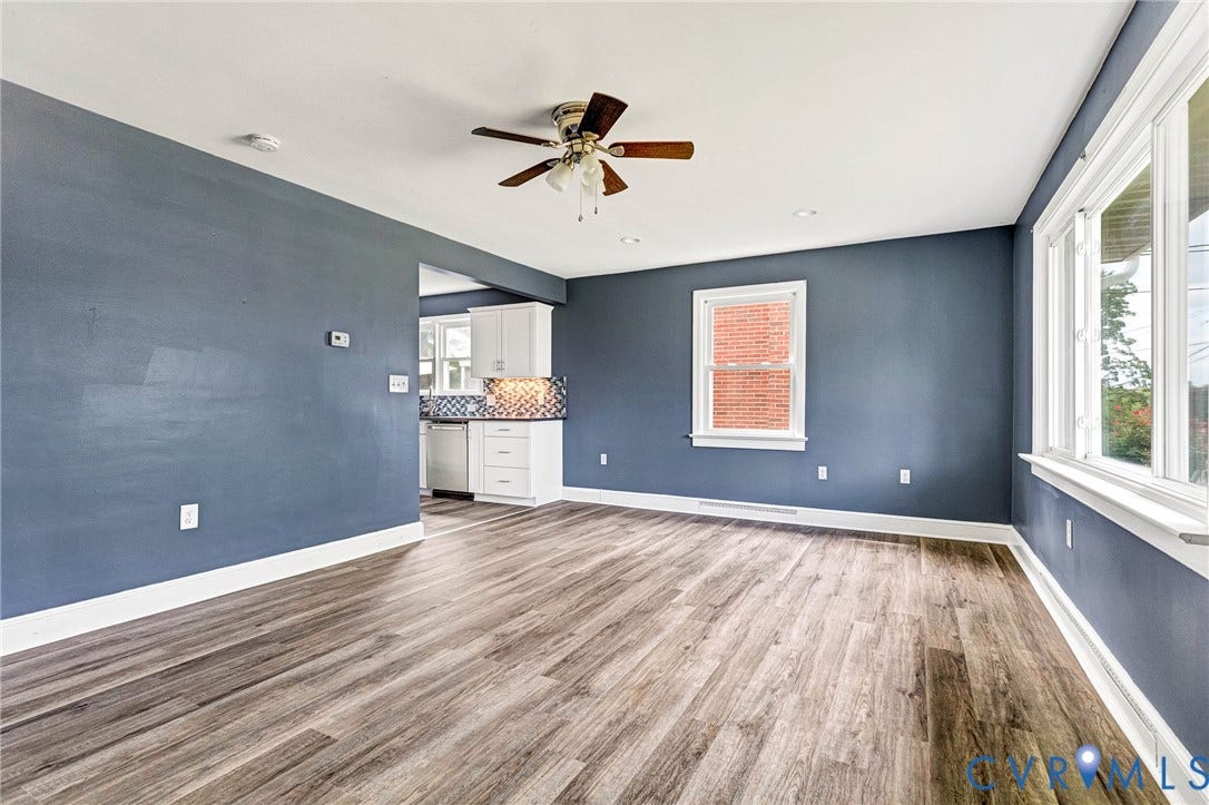 507 Walnut Avenue, Walnut Court, Colonial Heights, VA 23834 Wood-finish flooring, white window trim, and a ceiling fan with integrated lighting