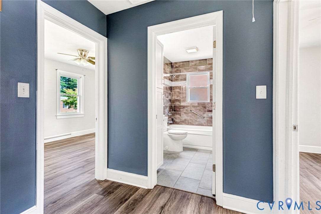 507 Walnut Avenue, Walnut Court, Colonial Heights, VA 23834 Wood-finish flooring throughout, with a window and ceiling fan in one room