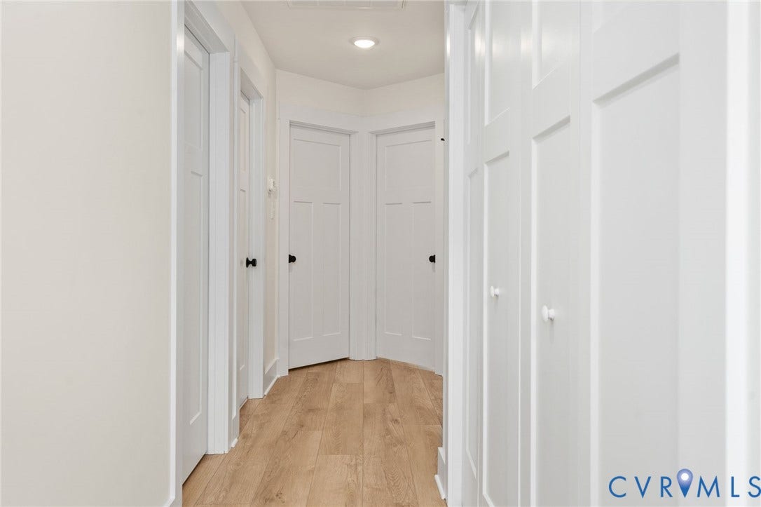 7603 Oster Drive, Chamberlayne Farms Area, Henrico, VA 23227 Light wood-finish flooring with white panel doors and recessed lighting
