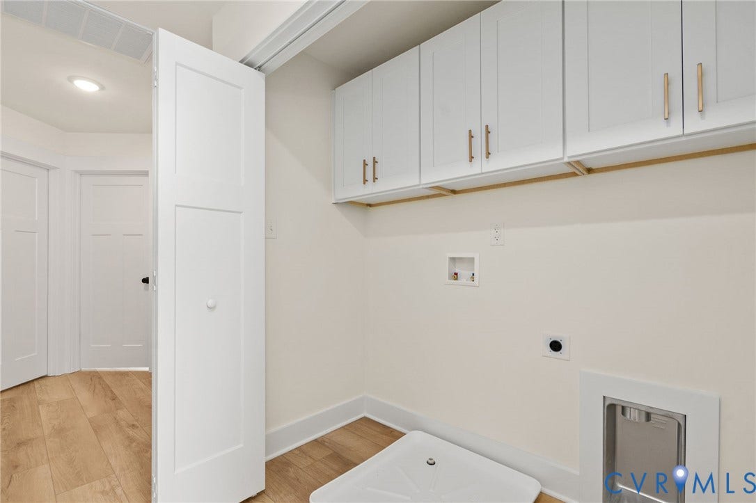 7603 Oster Drive, Chamberlayne Farms Area, Henrico, VA 23227 White shaker-style cabinetry with gold-tone hardware