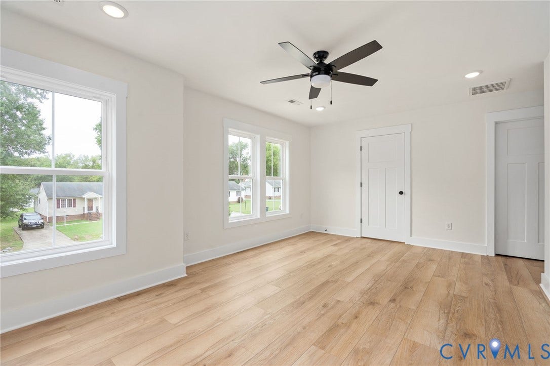 7603 Oster Drive, Chamberlayne Farms Area, Henrico, VA 23227 Wood-finish flooring, recessed lighting, ceiling fan, and white trim throughout