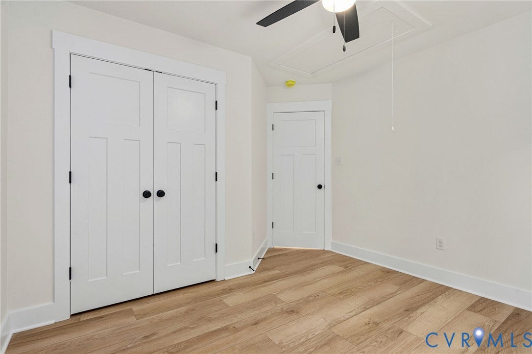 7603 Oster Drive, Chamberlayne Farms Area, Henrico, VA 23227 Light wood-finish flooring, white walls, and bright white trim