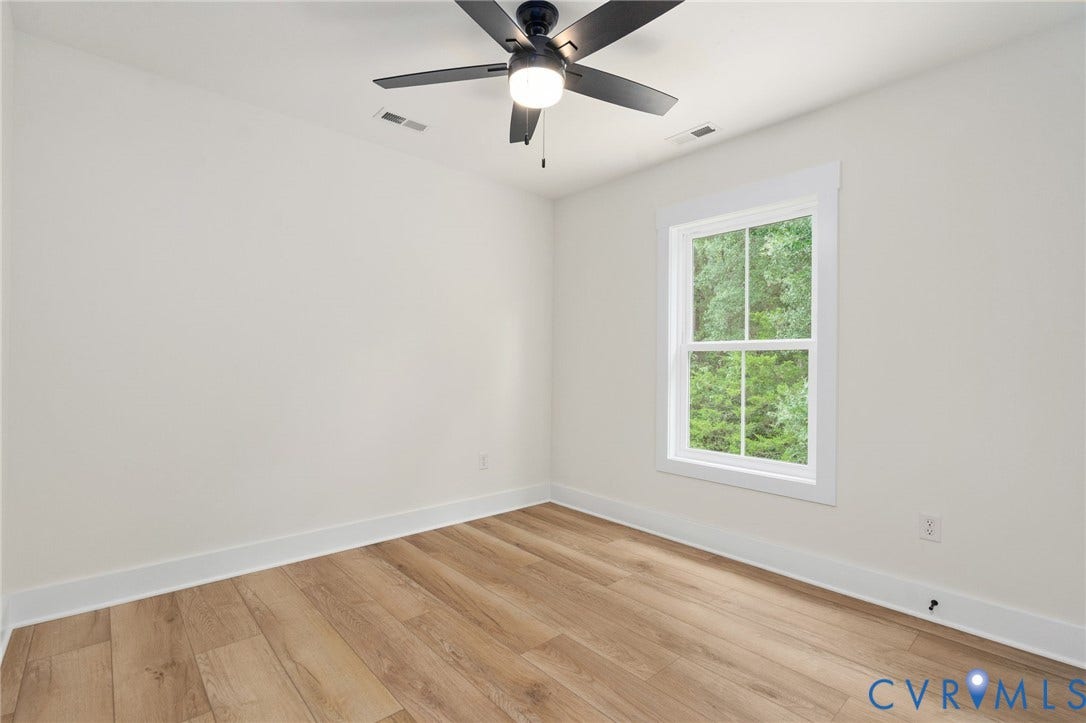 7603 Oster Drive, Chamberlayne Farms Area, Henrico, VA 23227 Wood-finish flooring, white trim, recessed lighting, and a ceiling fan with integrated light