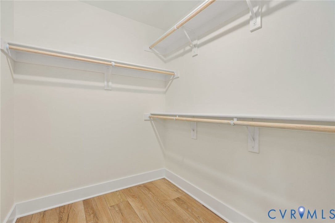 7603 Oster Drive, Chamberlayne Farms Area, Henrico, VA 23227 Custom closet system with multiple shelving units and hanging rods