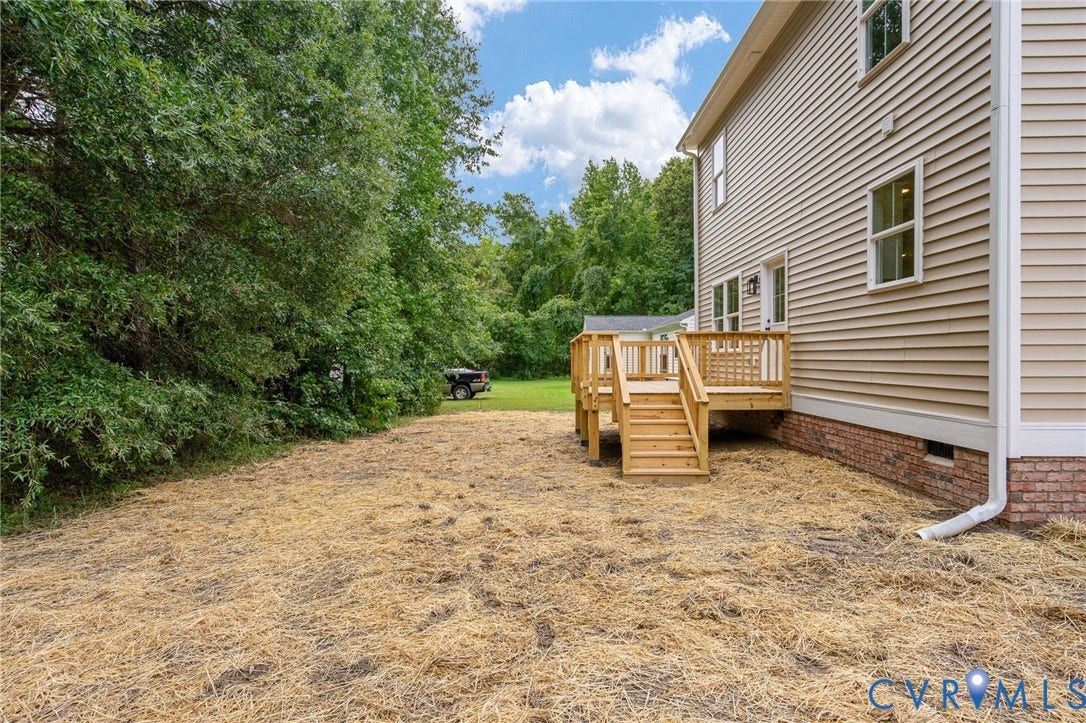 7603 Oster Drive, Chamberlayne Farms Area, Henrico, VA 23227 New construction siding exterior with a wood deck featuring stairs and railings
