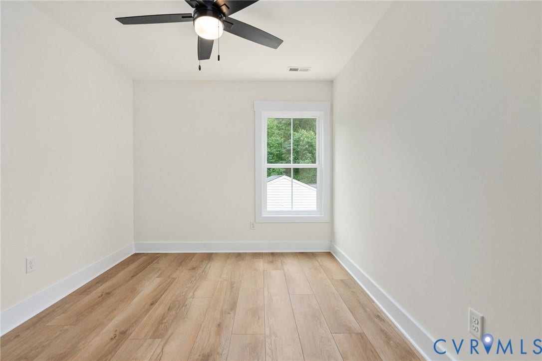 7603 Oster Drive, Chamberlayne Farms Area, Henrico, VA 23227 Wood-finish flooring, white walls, and a ceiling fan with integrated lighting