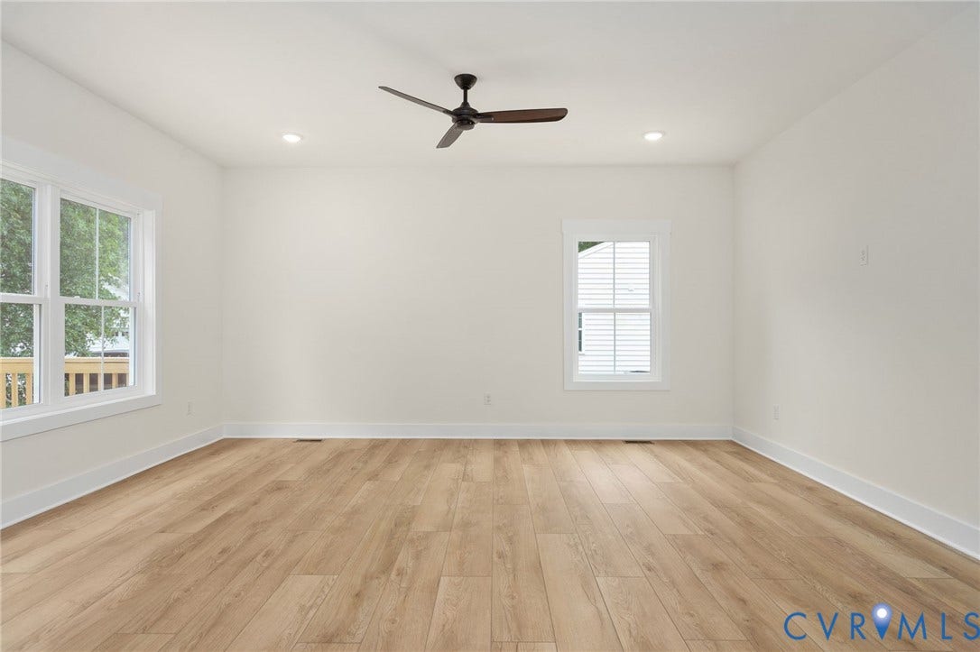 7603 Oster Drive, Chamberlayne Farms Area, Henrico, VA 23227 Spacious interior featuring wood-finish flooring, recessed lighting, and a ceiling fan
