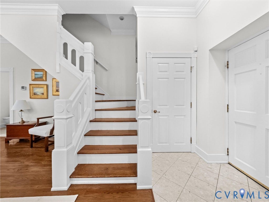 Staircase with wood-finish treads and white risers