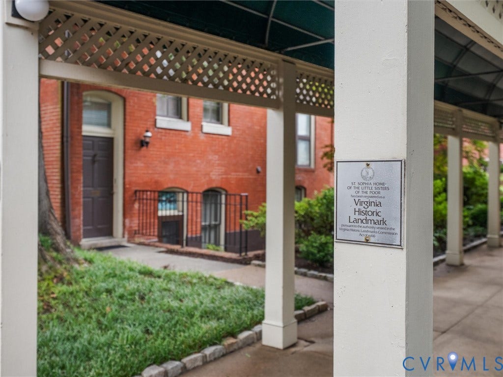 Brick exterior building with covered walkway