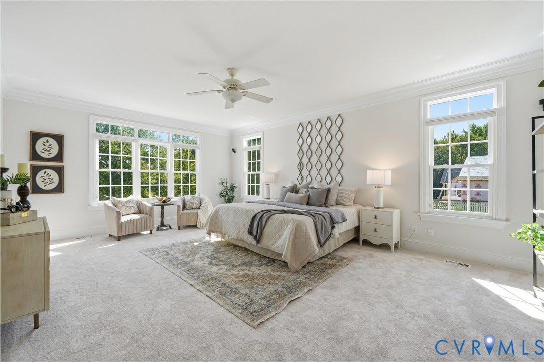 Serene first-floor primary bedroom with new plush carpeting (2026)