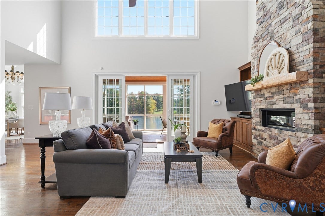 With sliding doors that frame the scenic pond views and let in ample nature light