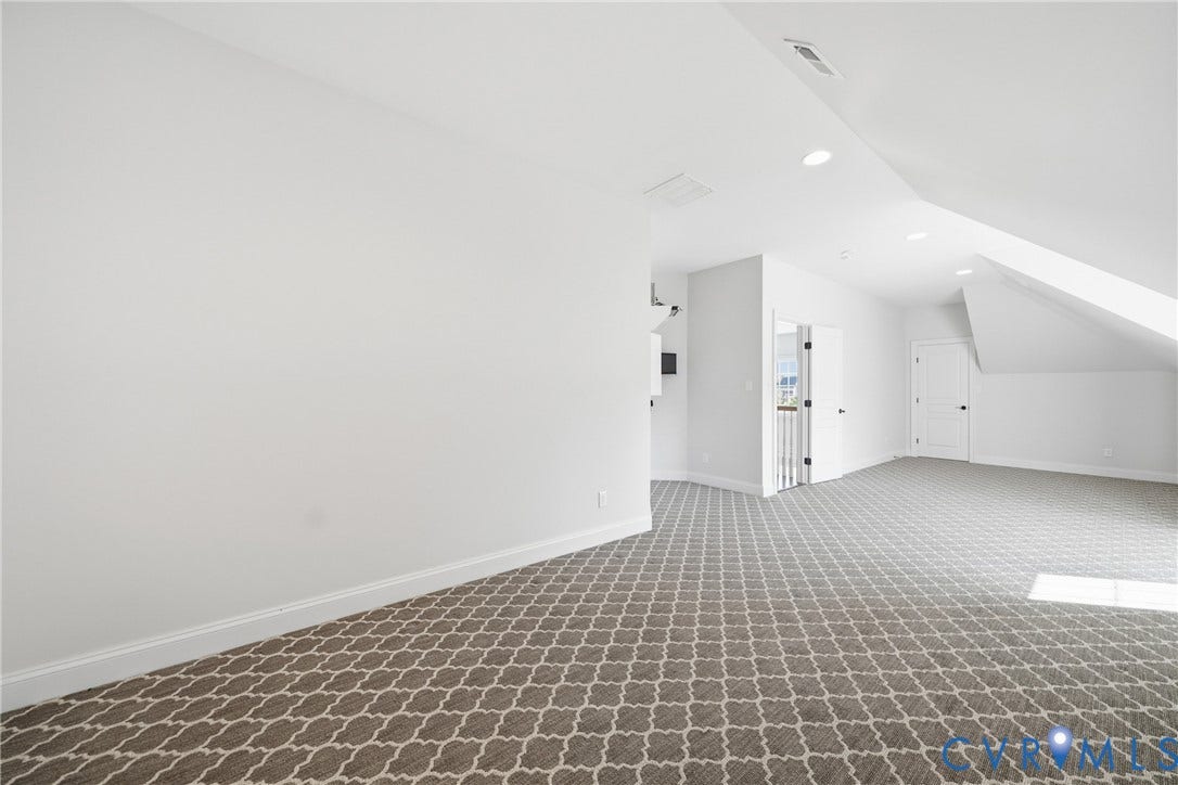 Bright and spacious bedroom with walk-in closet
