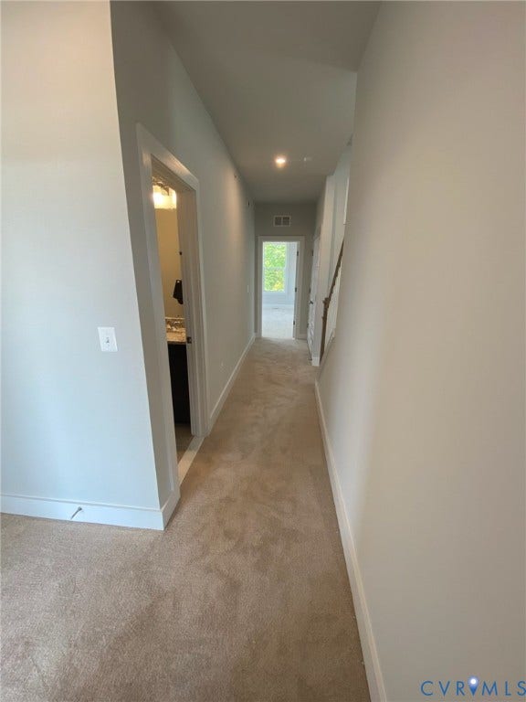2701 St Elias Drive, #B, Richmond, VA 23294 Neutral tone wall paint, recessed lighting, and carpet flooring
