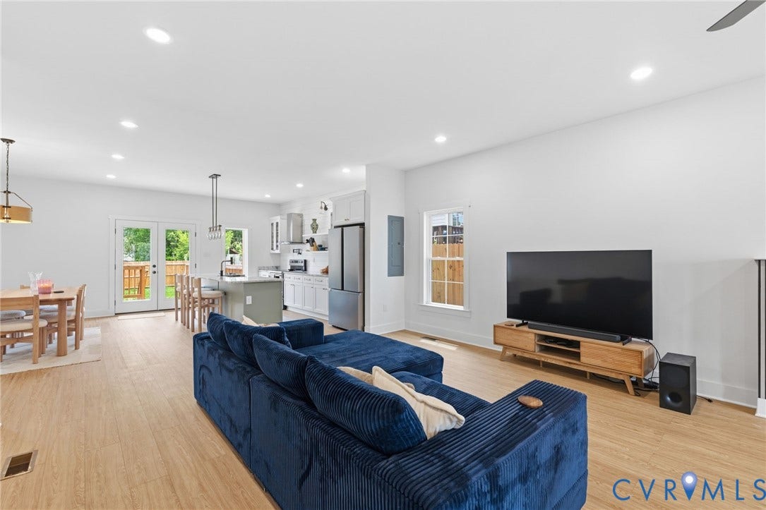 2506 Porter Street, Richmond, VA 23225 Open-concept living area featuring wood-finish flooring, recessed lighting, and white walls