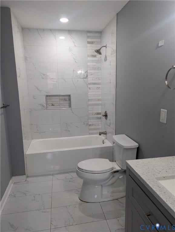 4202 Chamberlayne Avenue, Richmond, VA 23227 Recessed lighting, tile flooring, bathtub with tile surround, shower niche, and a single vanity with a solid surface countertop