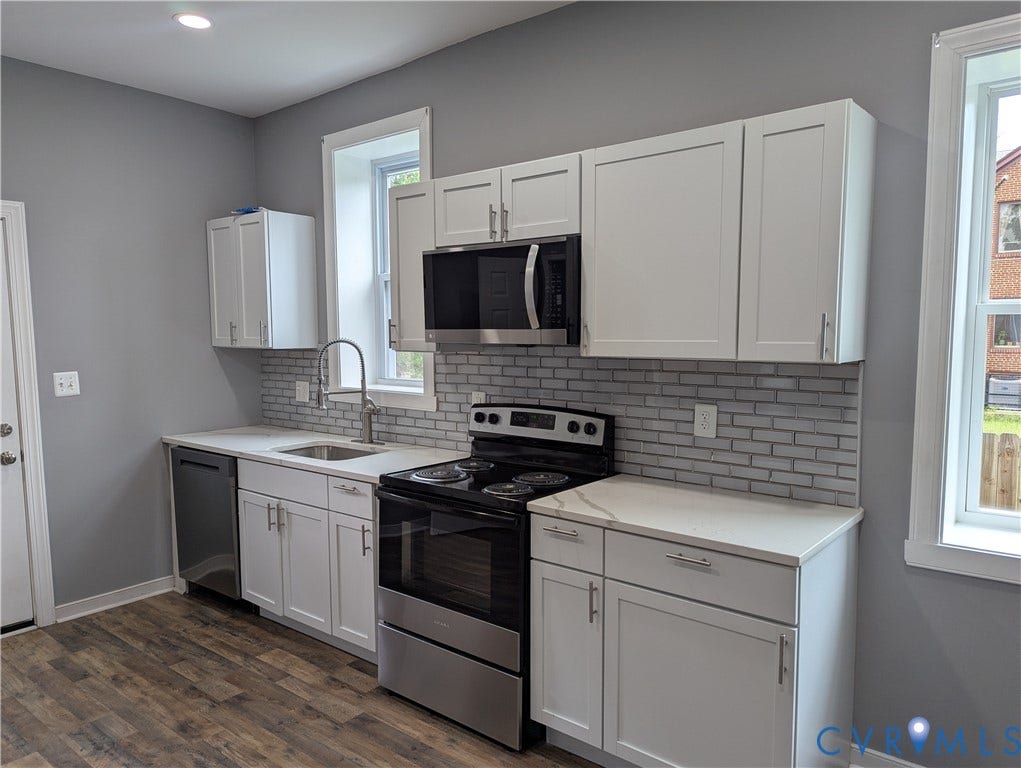 4202 Chamberlayne Avenue, Richmond, VA 23227 Wood-finish flooring, recessed lighting, and a paneled entry door with windowpanes