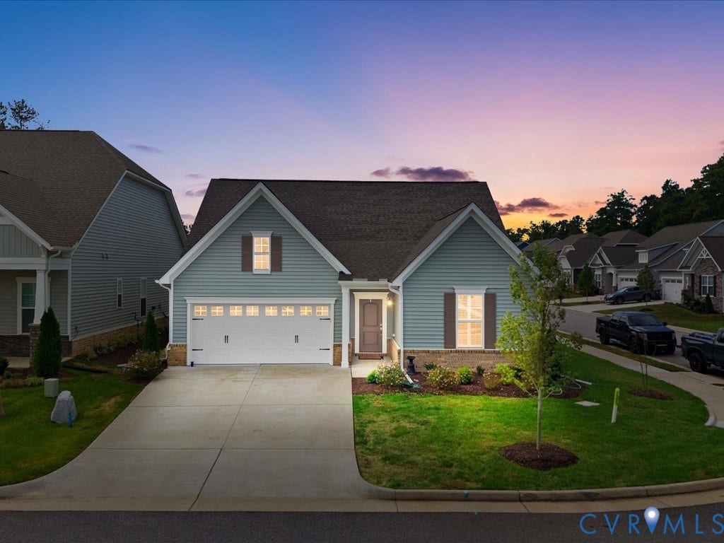 1801 Outrigger Drive, Meadowville Landing, Chesterfield, VA 23836 Light blue siding exterior with dark brown shutters