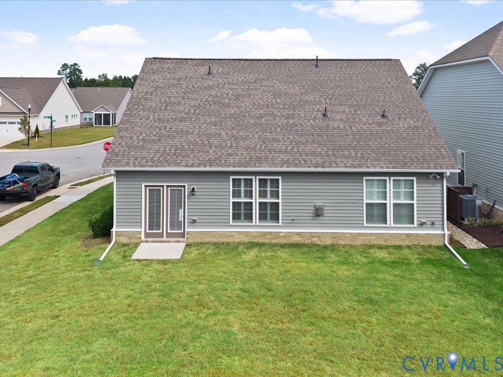 1801 Outrigger Drive, Meadowville Landing, Chesterfield, VA 23836 Gray siding exterior with a brown shingle roof, white trim windows, and a glass-paneled double door entry