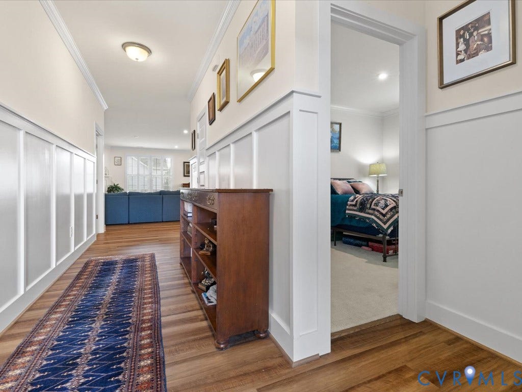 1801 Outrigger Drive, Meadowville Landing, Chesterfield, VA 23836 Warm wood-finish flooring with white wainscoting and crown molding