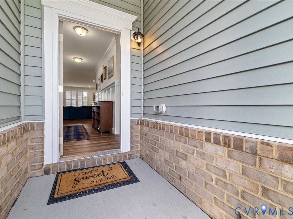 1801 Outrigger Drive, Meadowville Landing, Chesterfield, VA 23836 Gray siding exterior with a brick foundation
