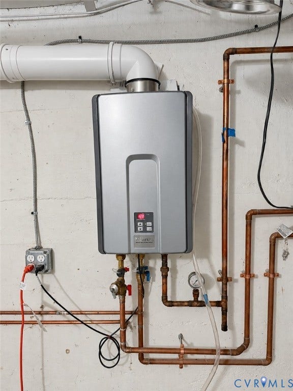 518 Central Terrace, Hopewell, VA 23860 Tankless water heater with copper piping and PVC ventilation