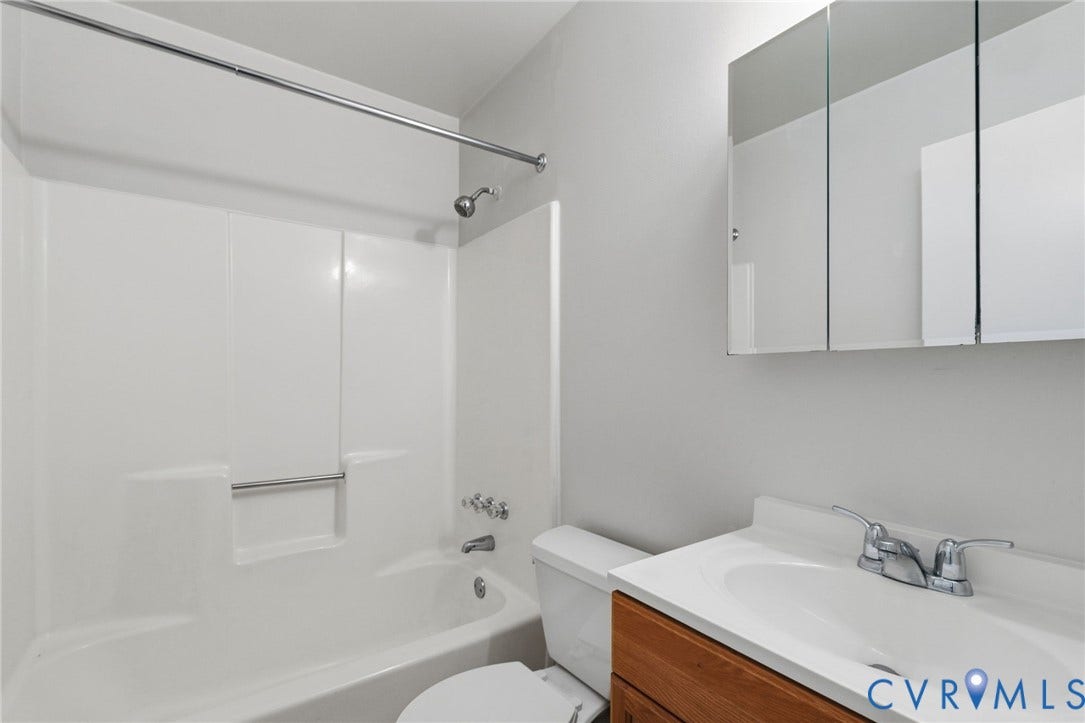 5571 Heatherhill Drive, Whale Rock, North Chesterfield, VA 23234 White acrylic tub and shower combination with chrome fixtures