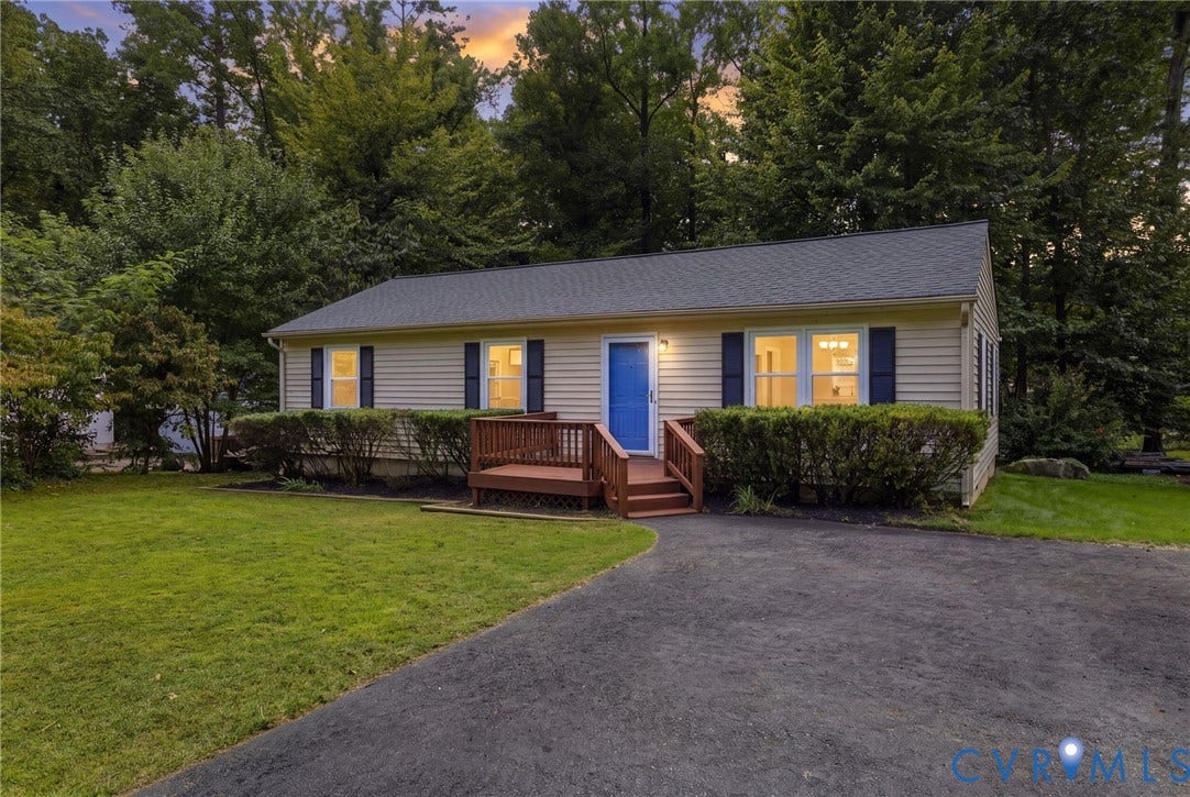 5571 Heatherhill Drive, Whale Rock, North Chesterfield, VA 23234 Ranch-style exterior with light-colored siding, dark shutters, and a bright blue entry door