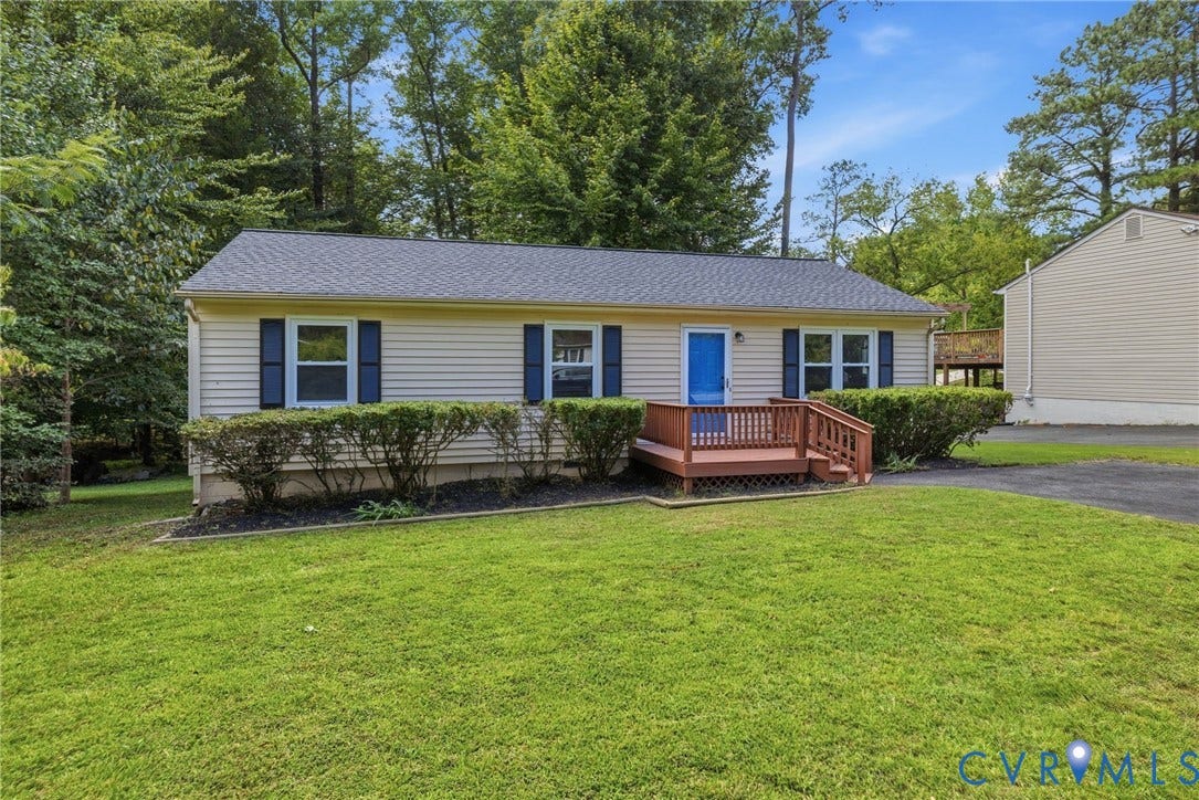 5571 Heatherhill Drive, Whale Rock, North Chesterfield, VA 23234 Ranch-style exterior with vinyl siding, blue shutters, and a wood deck with railings