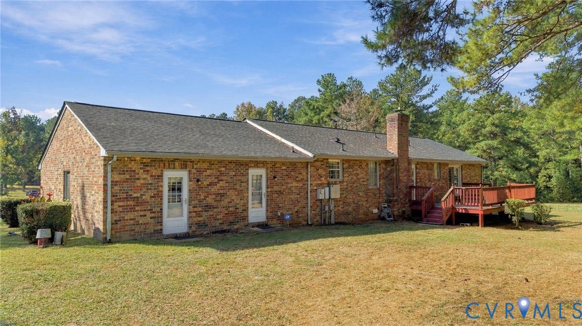 Surounded by 10 open acres, you'll love this back deck!