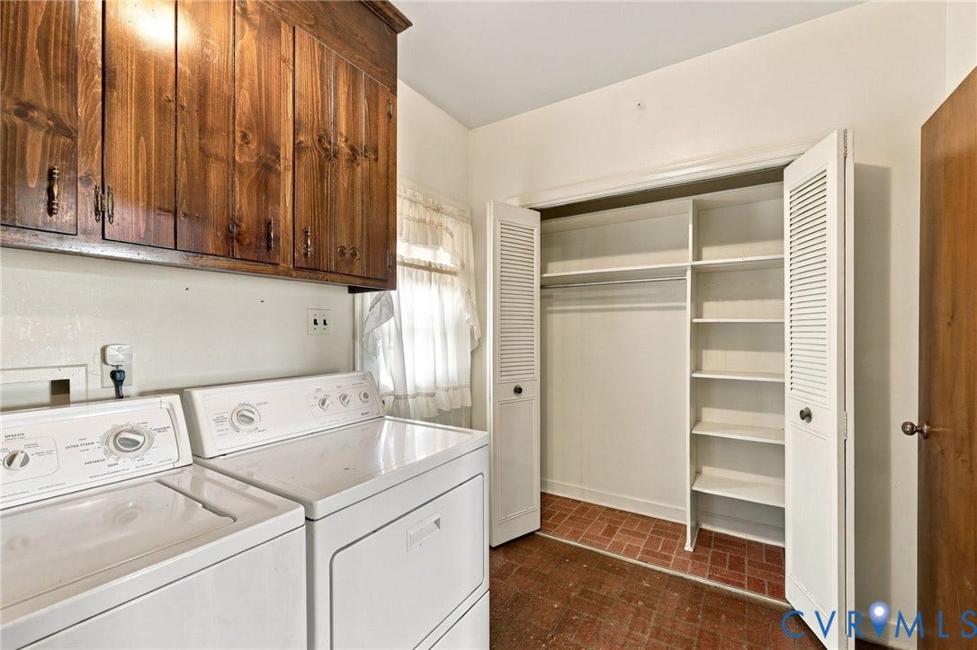 Extra storage and an exterior door in the laundry room.