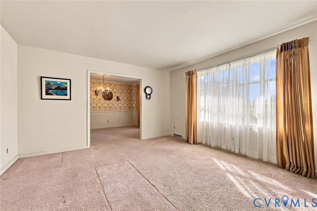 Living room opens to dining room