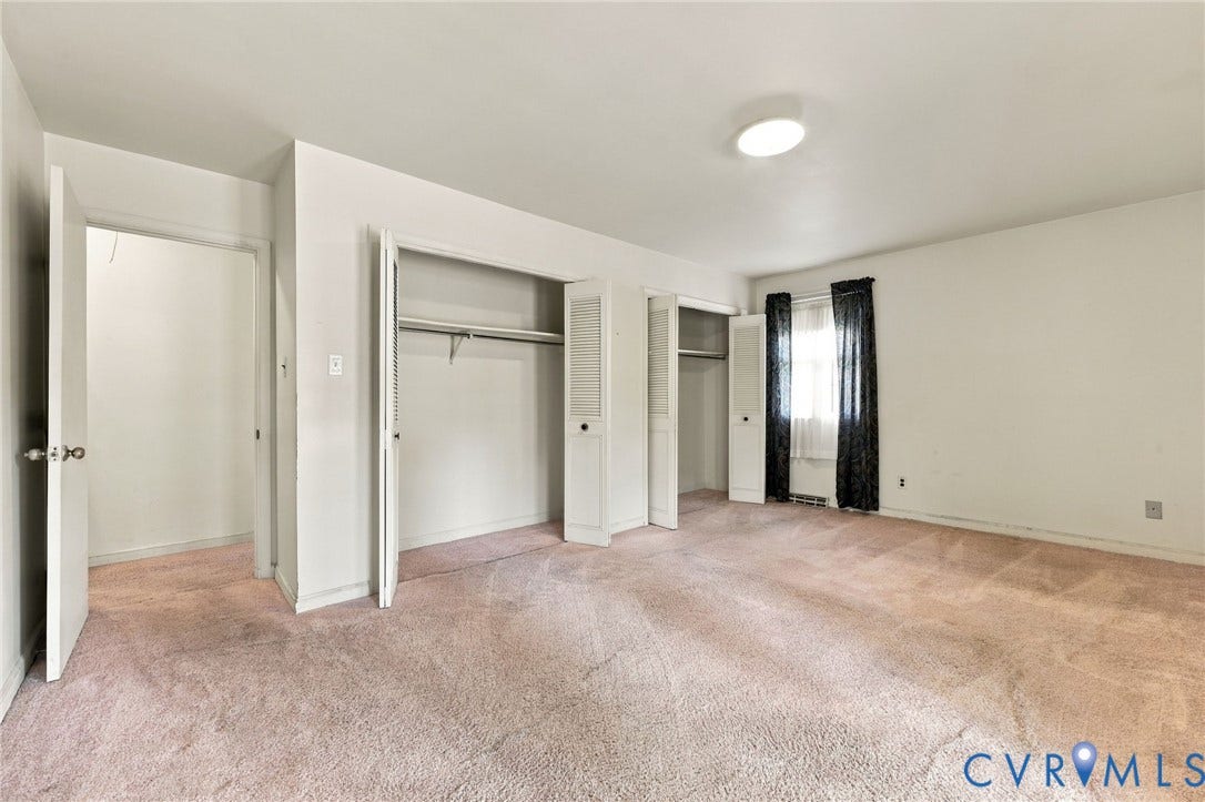 Primary bedroom with double closets and ensuite bath