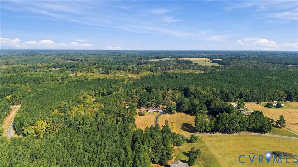 Property continues down woods on Glebe Road, and woods behind the home, and woods behind the neighbors to the right also.  58 acres woods, 10 acres open (approximately)