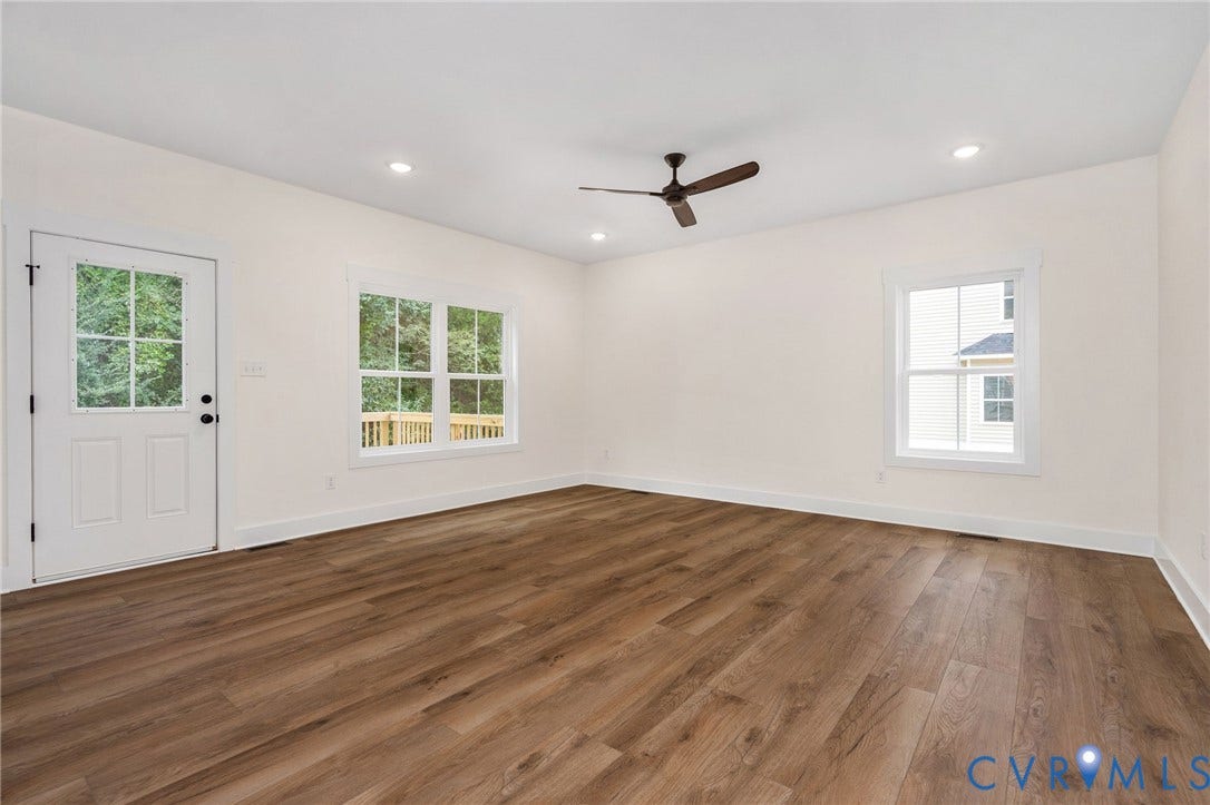 7605 Oster Drive, Chamberlayne Farms Area, Henrico, VA 23227 Wood-finish flooring, recessed lighting, ceiling fan, multiple windows, and a glass-paneled exterior door