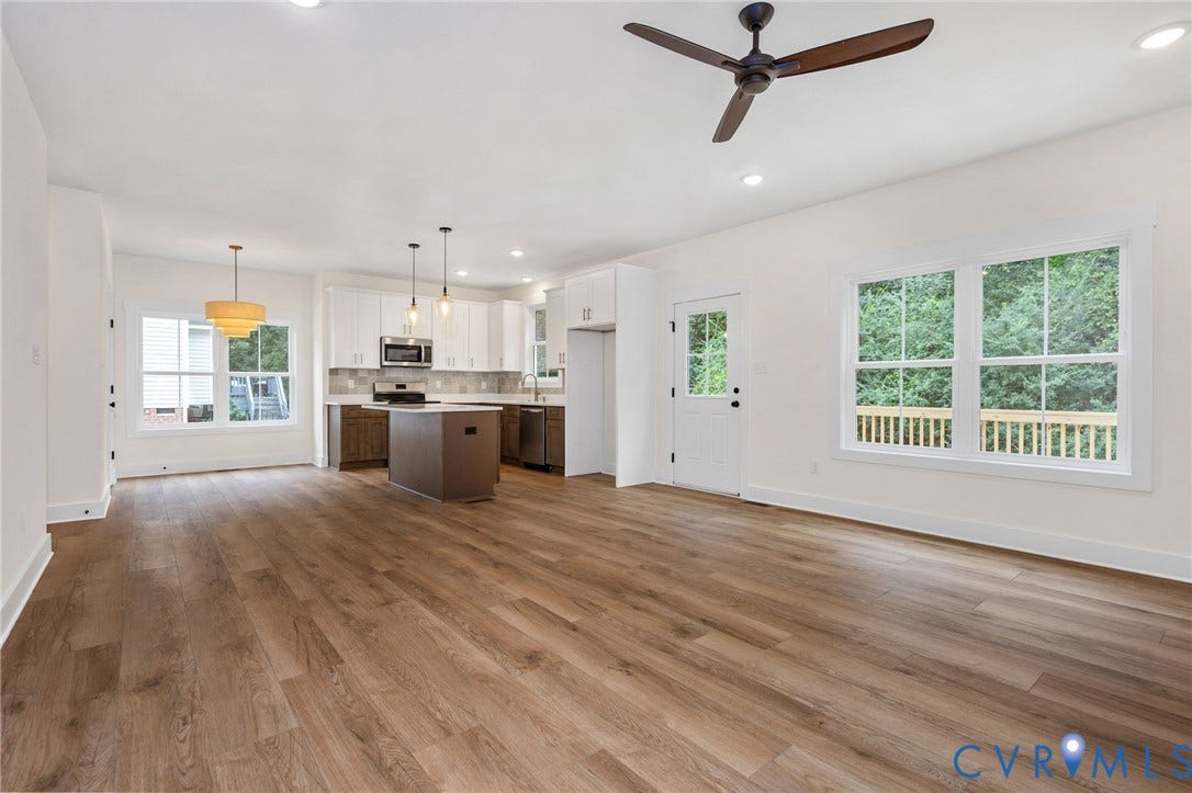 7605 Oster Drive, Chamberlayne Farms Area, Henrico, VA 23227 Open-concept living space featuring wood-finish flooring, recessed lighting, and a modern ceiling fan