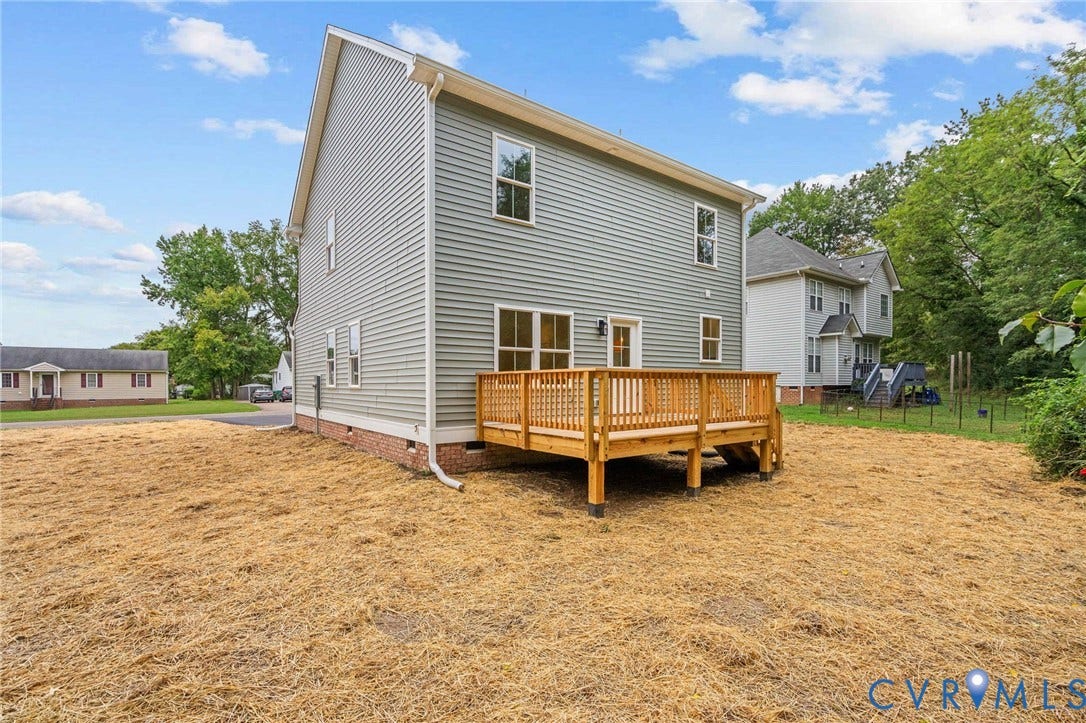7605 Oster Drive, Chamberlayne Farms Area, Henrico, VA 23227 Spacious exterior featuring light gray horizontal siding and a red brick foundation