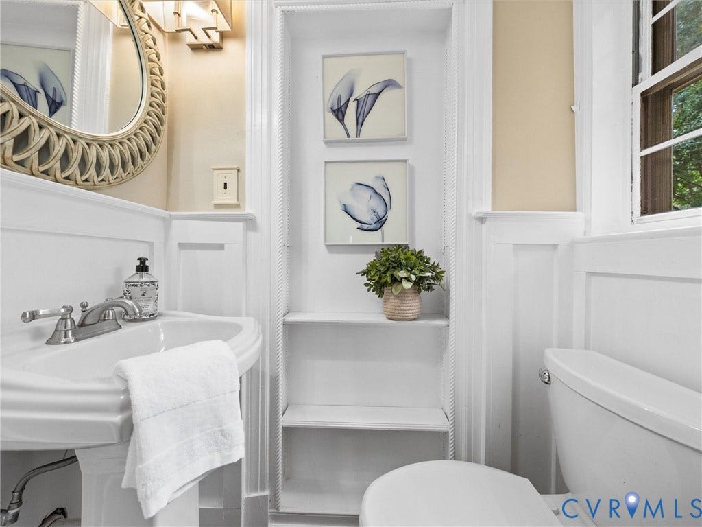 1113 E Durwood Crescent, Tuckahoe Area, Henrico, VA 23229 Pedestal sink with chrome fixtures, built-in shelving, wainscoting, and a window with natural light