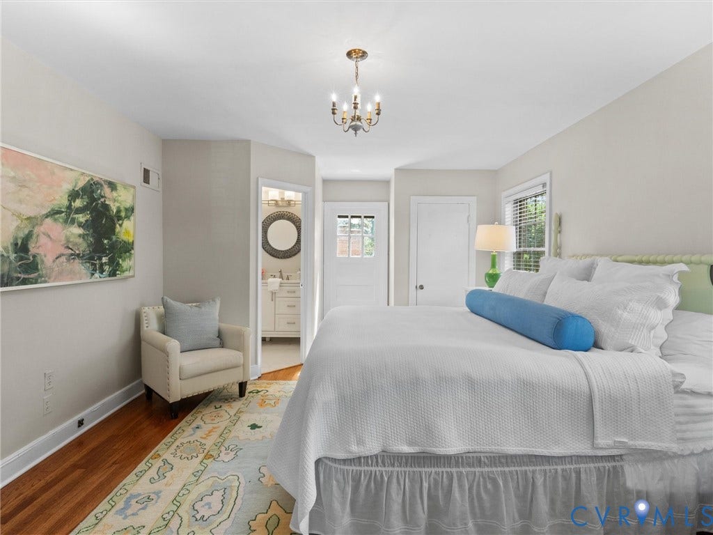 1113 E Durwood Crescent, Tuckahoe Area, Henrico, VA 23229 Hardwood flooring, crown molding, a built-in window, a ceiling-mounted light fixture, and a paneled door