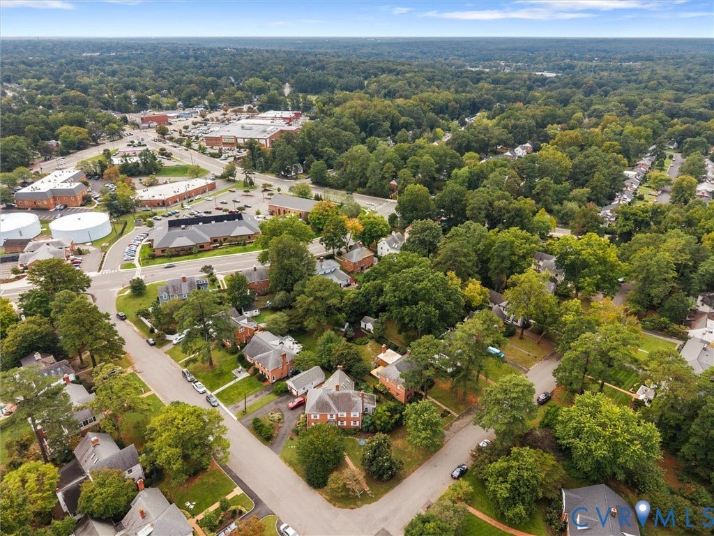 1113 E Durwood Crescent, Tuckahoe Area, Henrico, VA 23229 Aerial perspective showcasing a residential area with mature trees, established streets, and commercial buildings