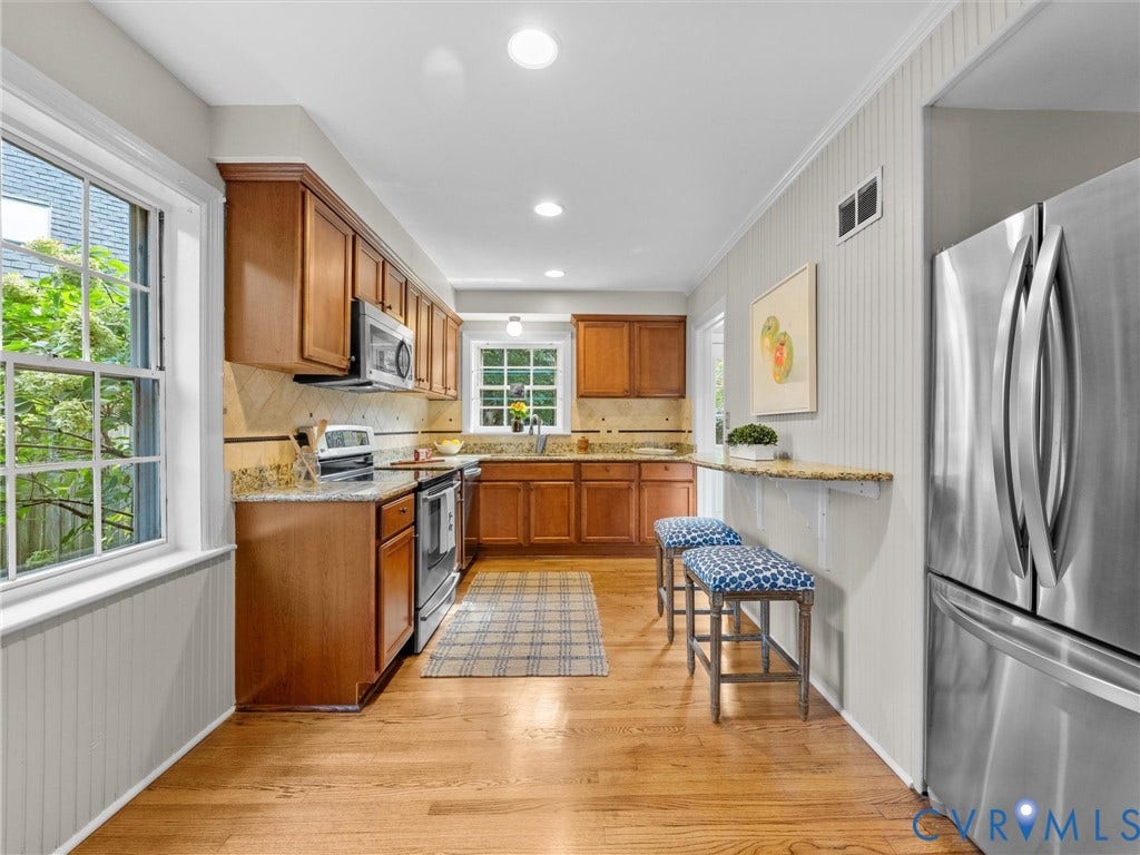 1113 E Durwood Crescent, Tuckahoe Area, Henrico, VA 23229 Kitchen featuring wood-finish flooring, recessed lighting, and wood cabinetry with light-colored countertops