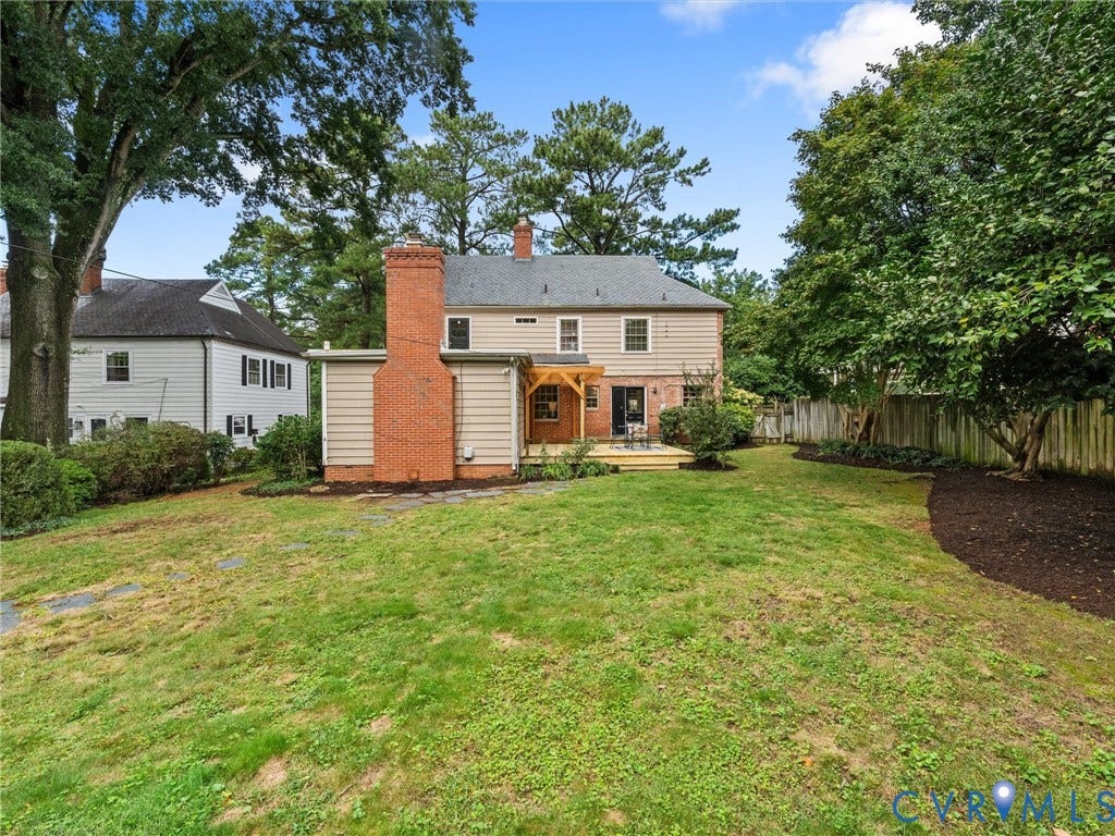 1113 E Durwood Crescent, Tuckahoe Area, Henrico, VA 23229 Expansive lawn area with mature trees and a privacy fence