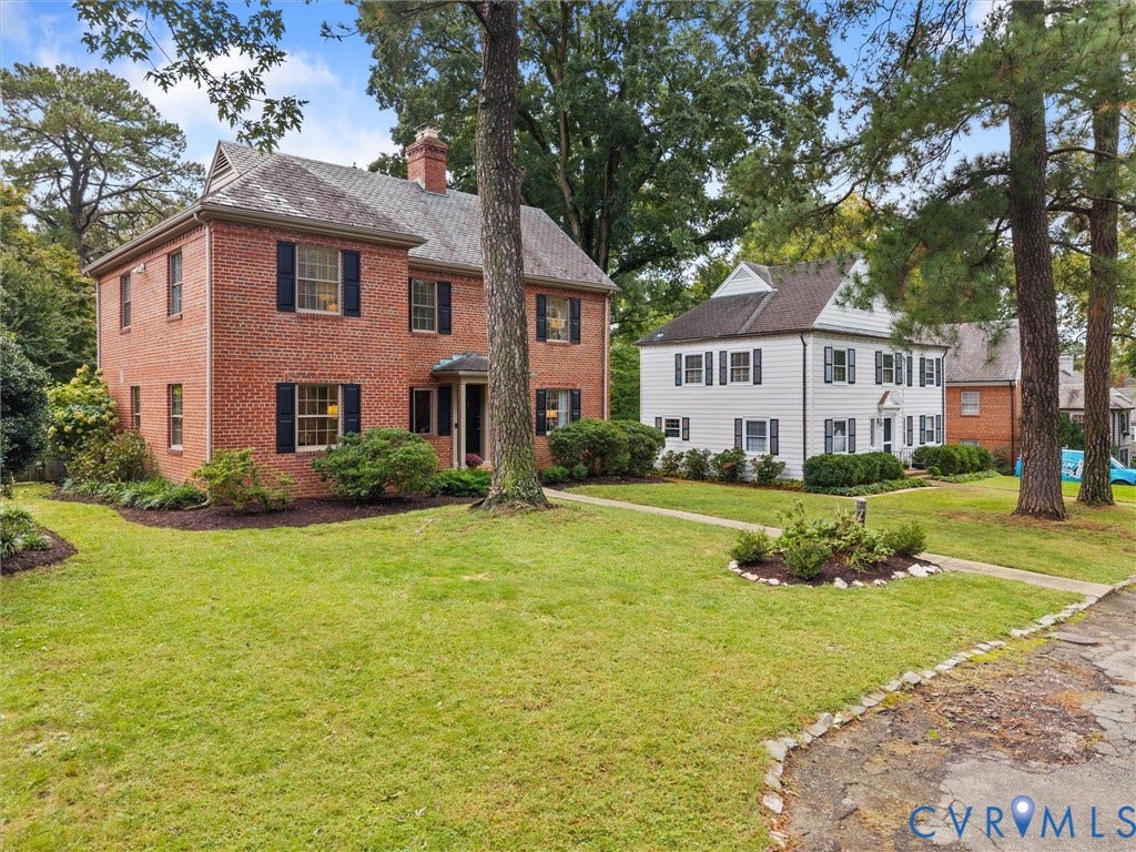 1113 E Durwood Crescent, Tuckahoe Area, Henrico, VA 23229 Brick exterior with black shutters and a slate-style roof